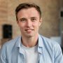 portrait-handsome-man-smiling_23-2148729669
